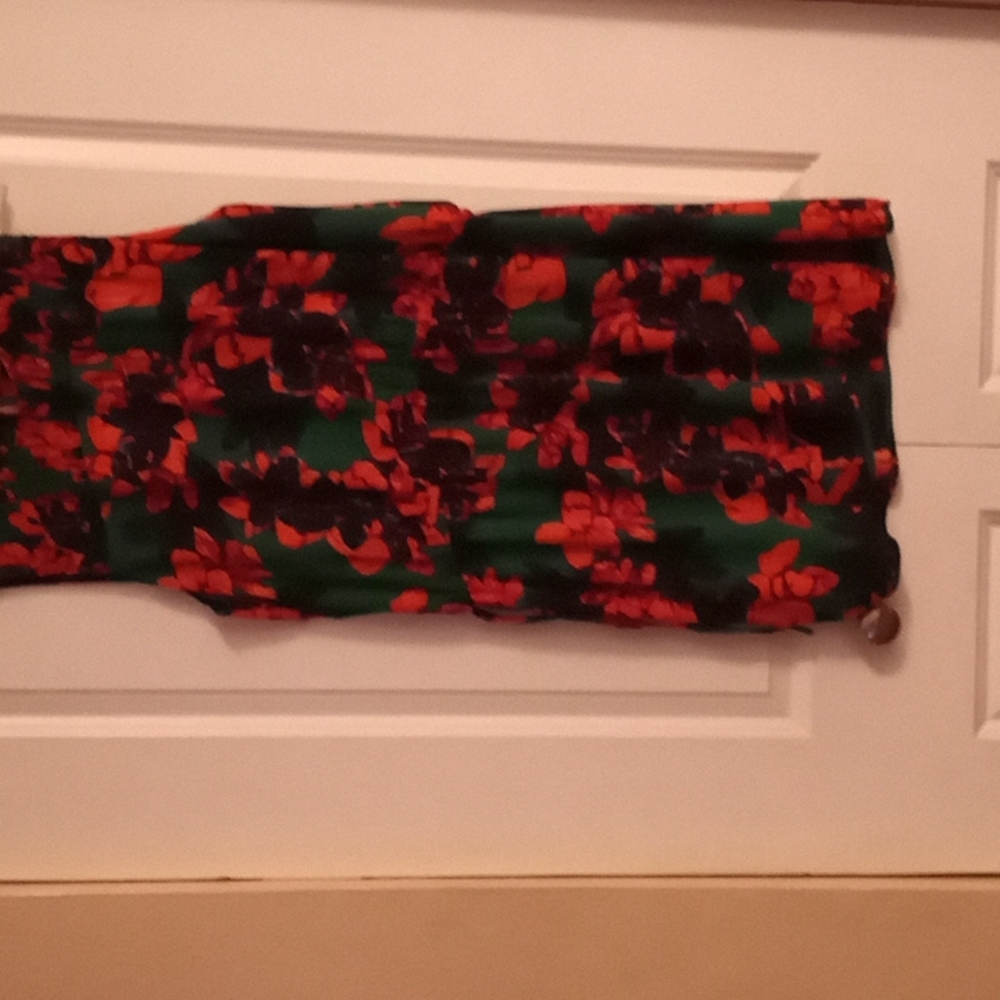 Brand new dark green with orange flowers very nice
